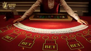 a dealer standing on a blackjack table