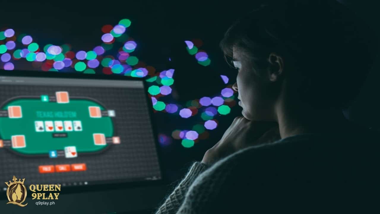 a woman infront of a laptop playing online poker